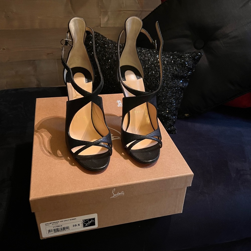 Christian Louboutin black sandals. Never been worn, receipt included.